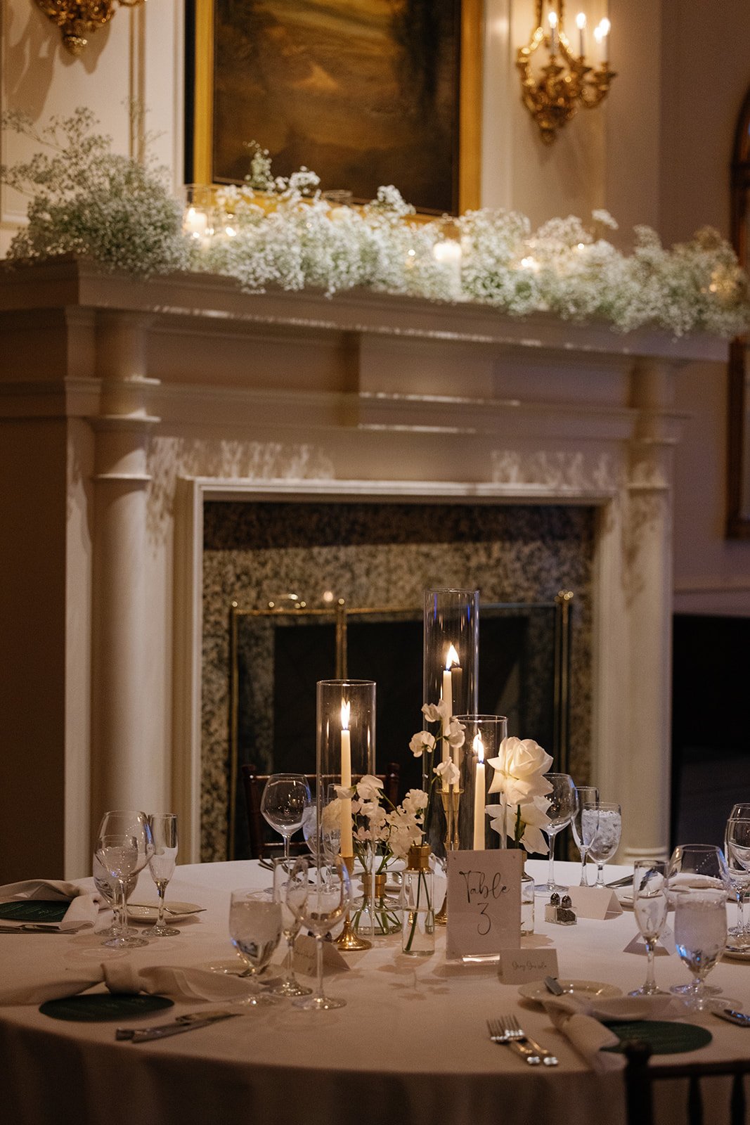 Winter wedding at Army Navy Country Club wedding with baby's breath white and cream florals